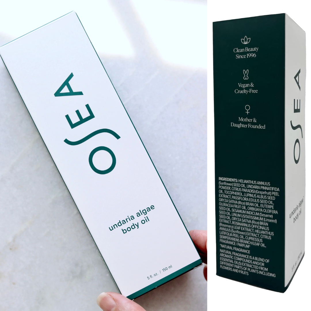 OSEA undaria algae body oil packaging on a marble surface